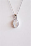 COLGANTE OVALADO DE PIEDRA LUNA EN PLATA DE LEY