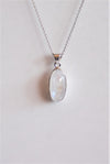 COLGANTE OVALADO DE PIEDRA LUNA EN PLATA DE LEY