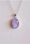 Colgante ovalado de piedra luna rosa en plata de ley