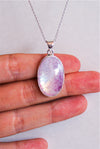 Colgante ovalado de piedra luna rosa en plata de ley