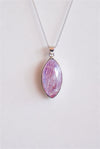Colgante de piedra luna rosa en plata de ley