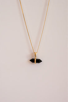  Colgante biterminado obsidiana de bronce