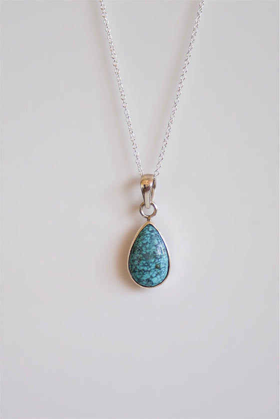 Colgante de turquesa natural en plata