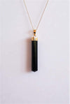 Colgante turmalina negra cristal bañada en oro