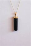 Colgante turmalina negra cristal bañada en oro
