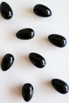 Huevo yoni de obsidiana con agujero