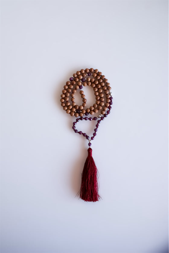 Japa Mala de Rubí facetado